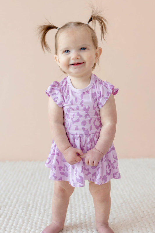 Kyte Baby Twirl Bodysuit Dress in Thistle Leopard