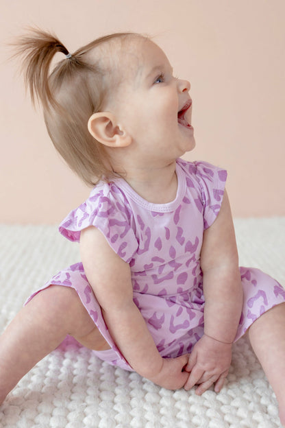 Kyte Baby Twirl Bodysuit Dress in Thistle Leopard