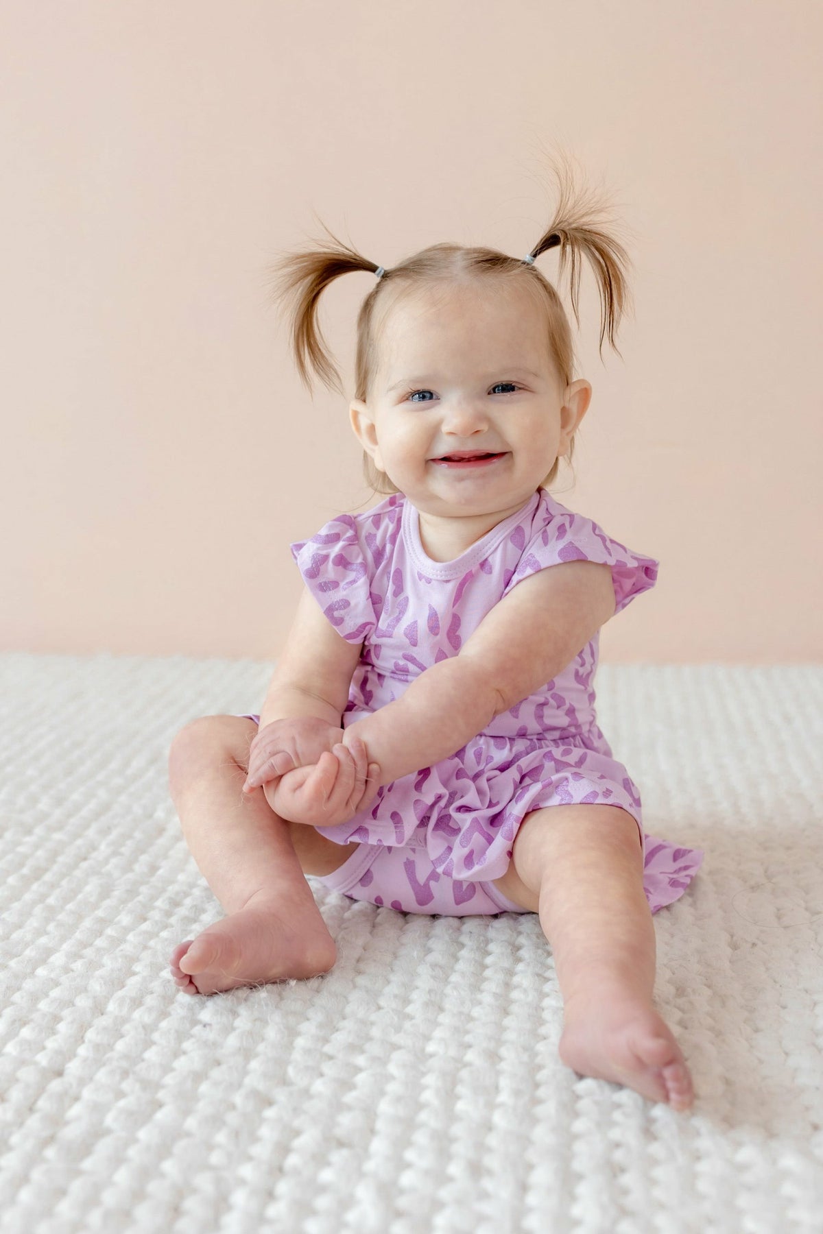 Kyte Baby Twirl Bodysuit Dress in Thistle Leopard