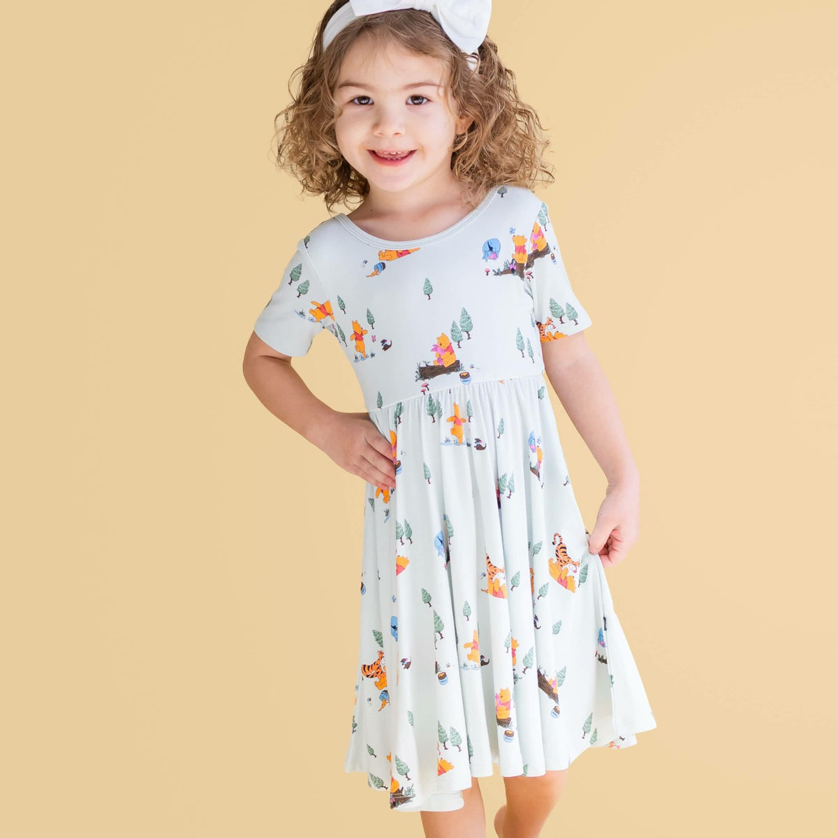 Kyte Baby Twirl Dress in Winnie the Pooh Hundred Acre Wood