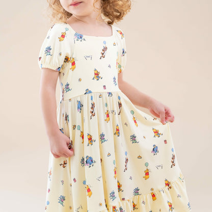 Kyte Baby Puff Sleeve Twirl Dress in Winnie the Pooh Celebration