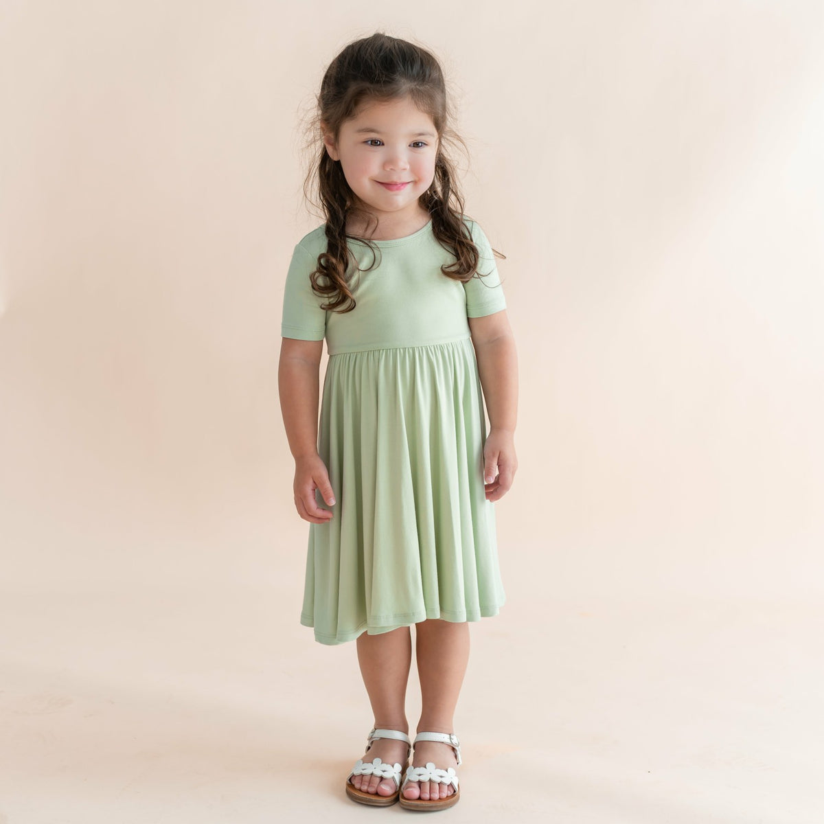 Kyte Baby Twirl Dress in Basil
