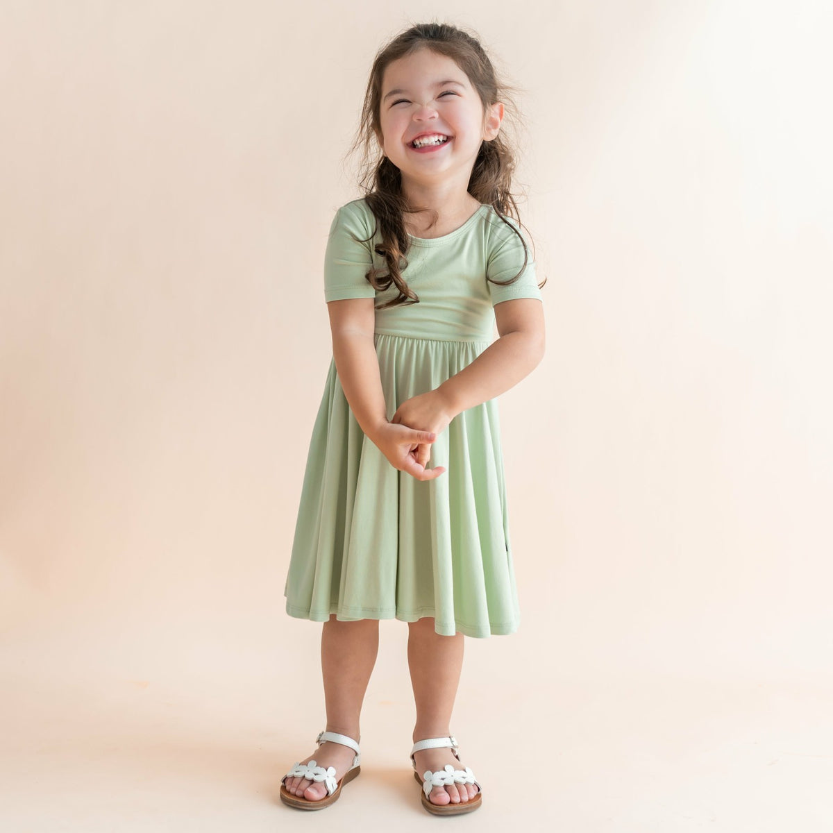 Kyte Baby Twirl Dress in Basil