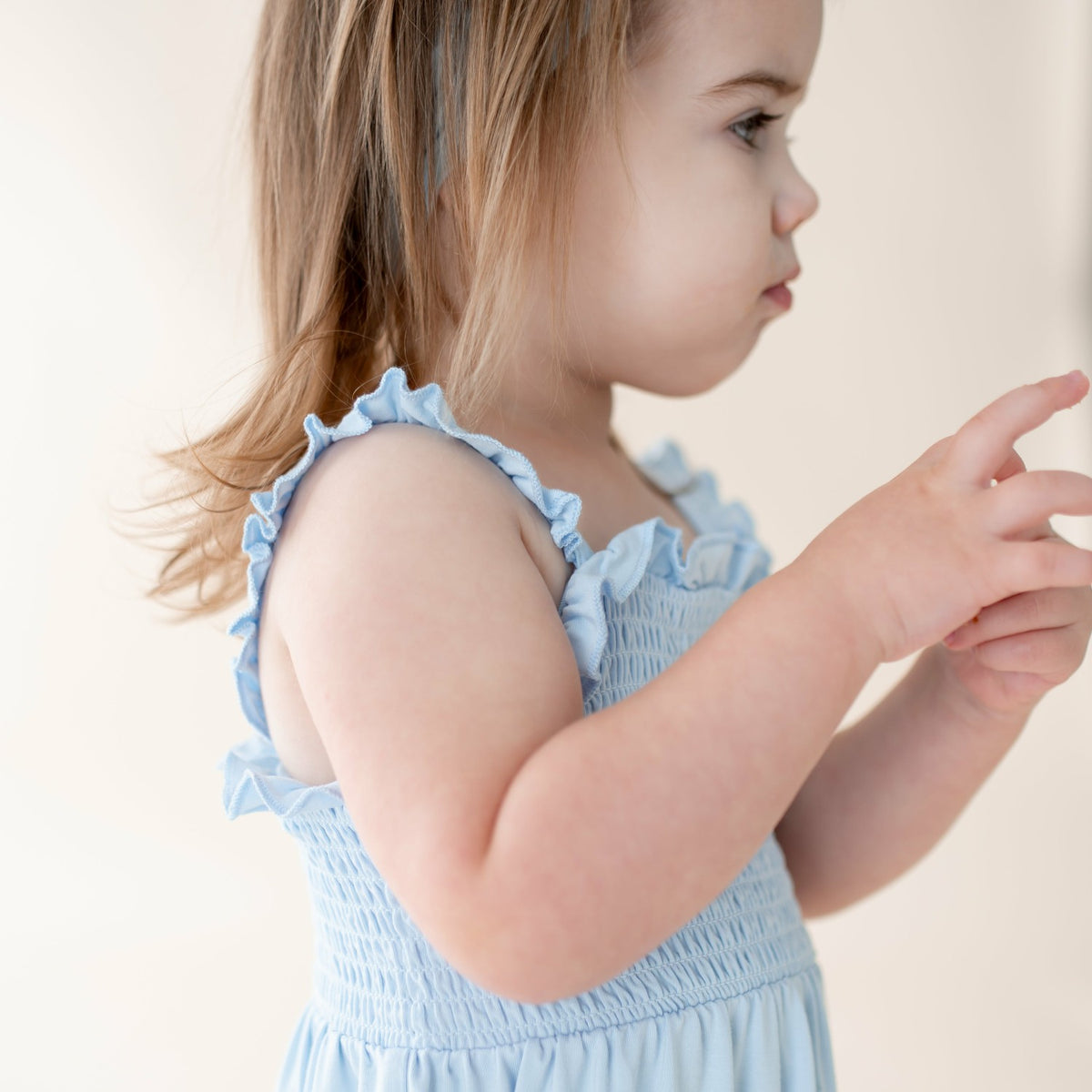 Kyte Baby Smocked Dress in Breeze