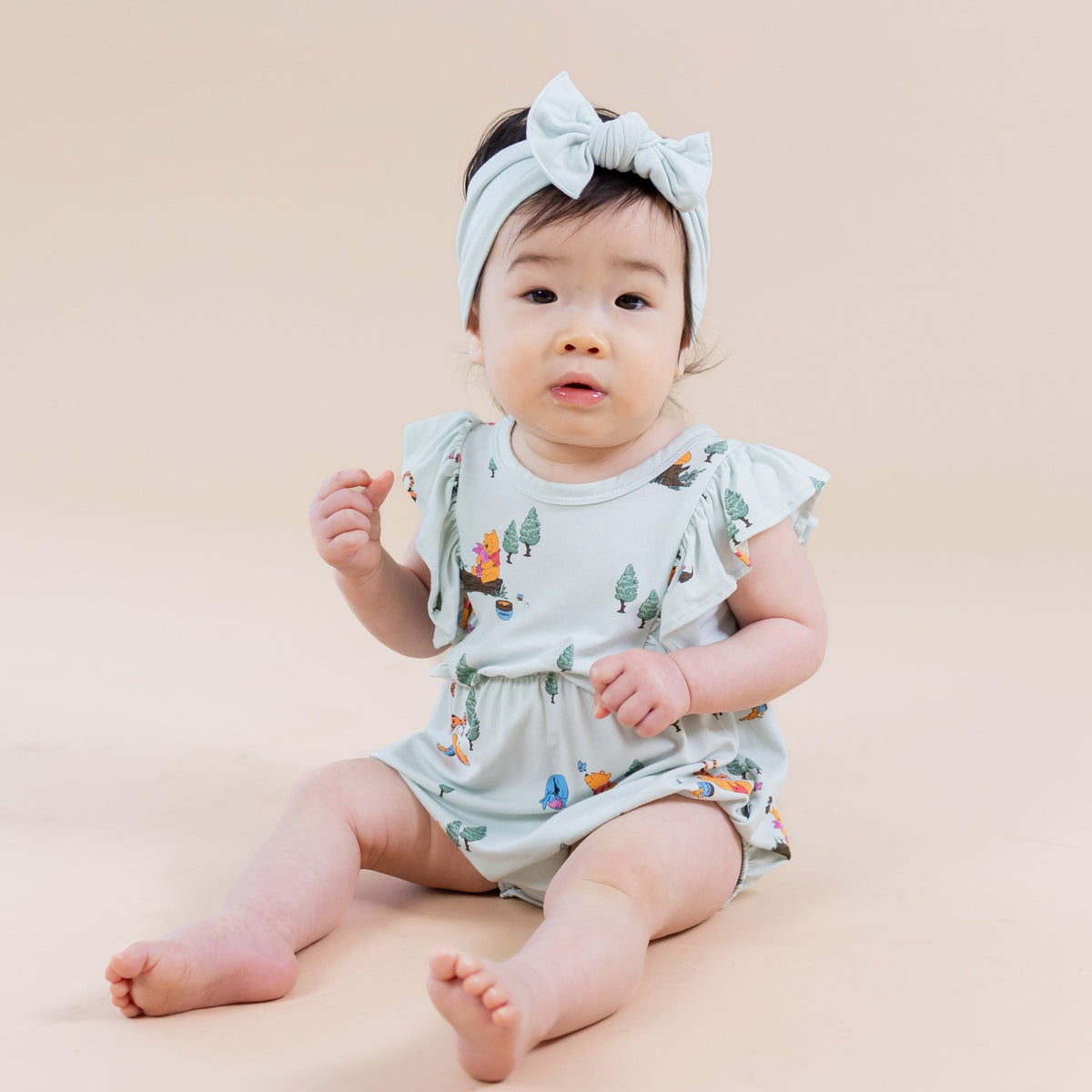 Kyte Baby Bubble Romper in Winnie the Pooh Hundred Acre Wood