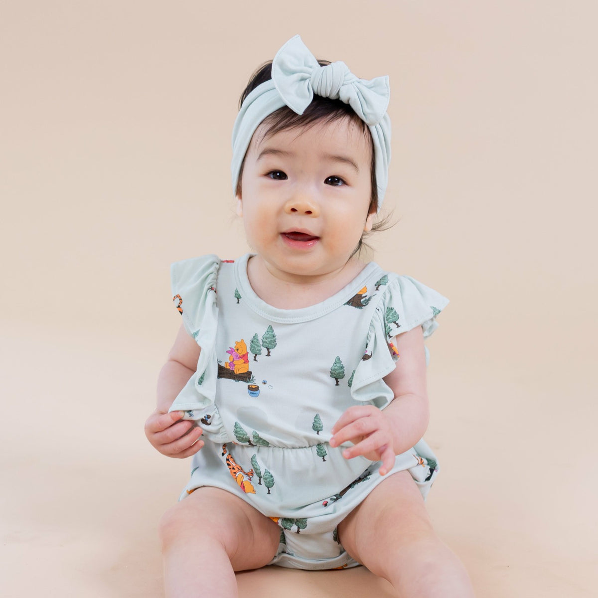 Kyte Baby Bubble Romper in Winnie the Pooh Hundred Acre Wood