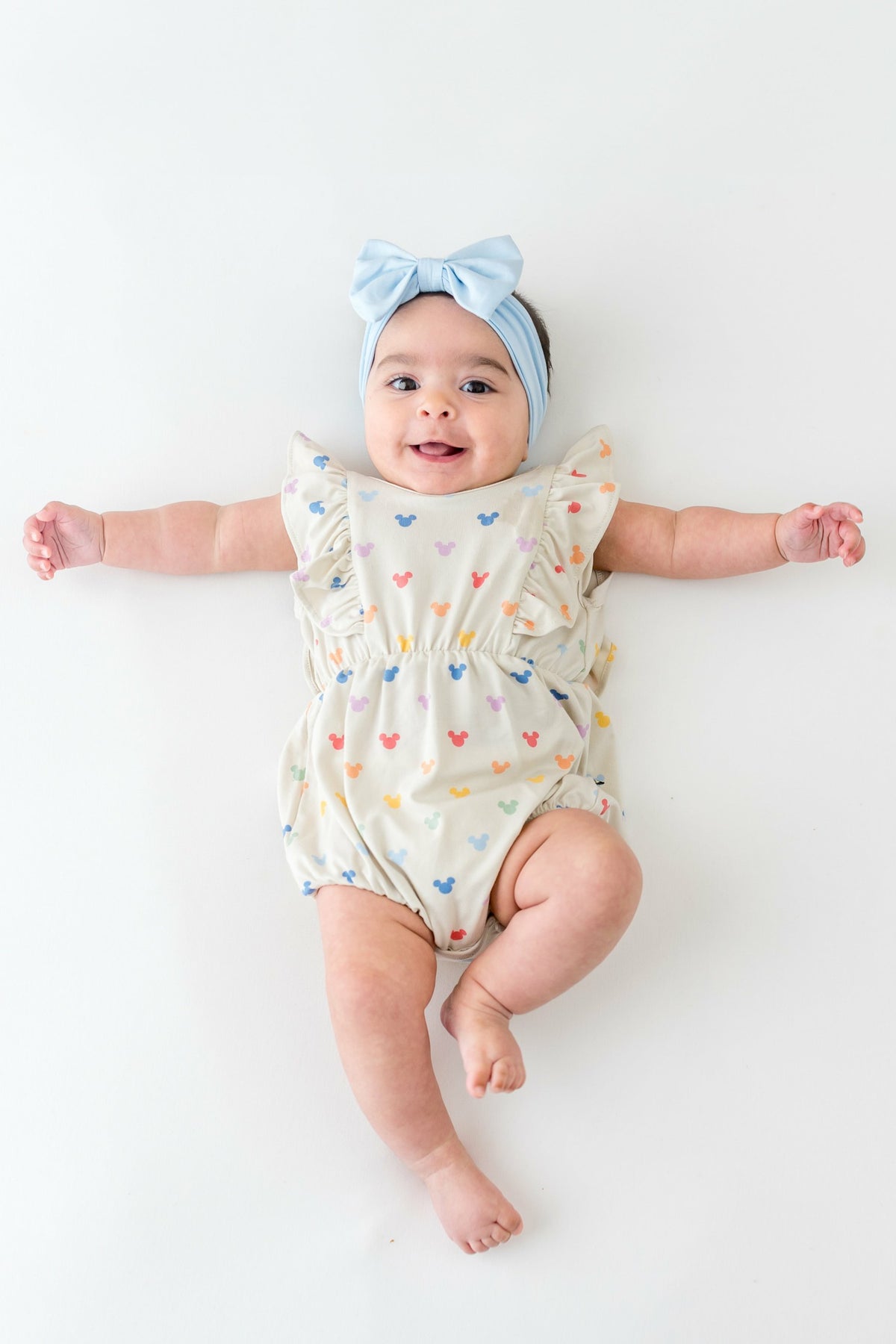 Kyte Baby Bubble Romper in Pastel Mickey Mouse