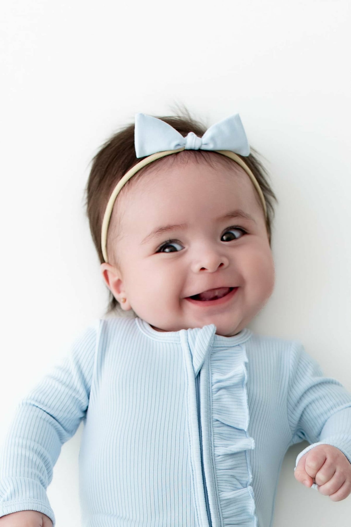 Kyte Baby Ribbed Ruffle Zipper Footie in Breeze