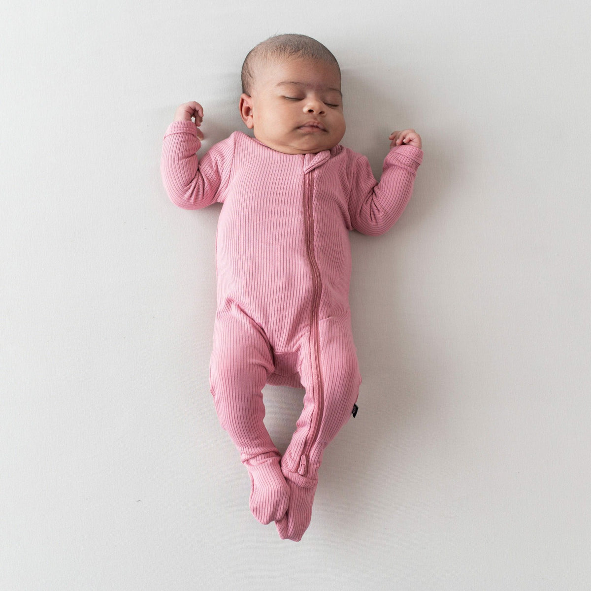 Kyte Baby Ribbed Zipper Footie in Apple Blossom