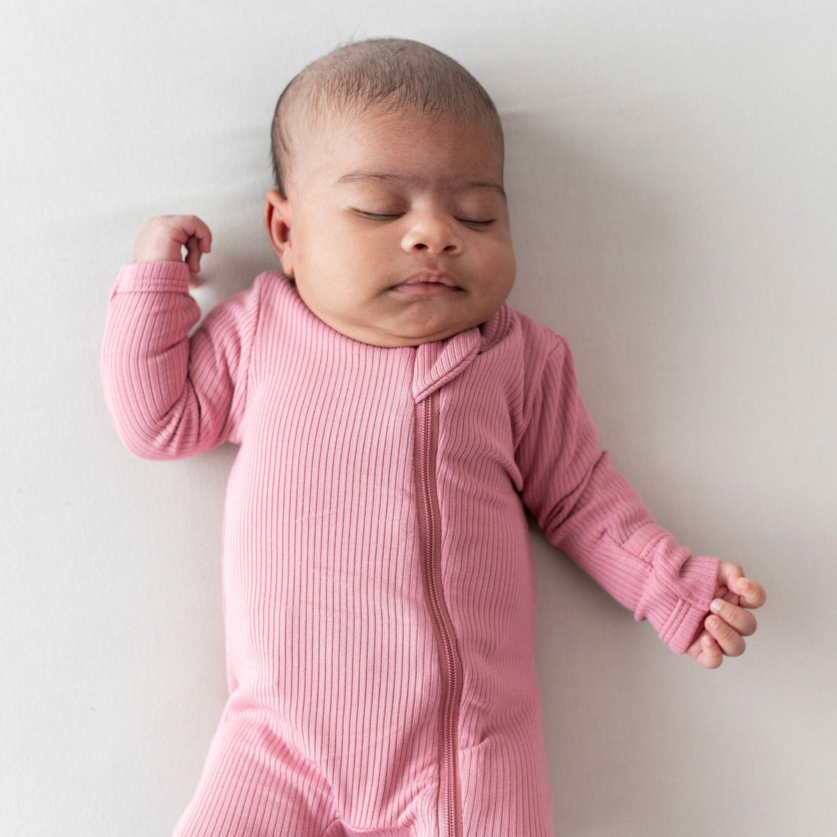 Kyte Baby Ribbed Zipper Footie in Apple Blossom
