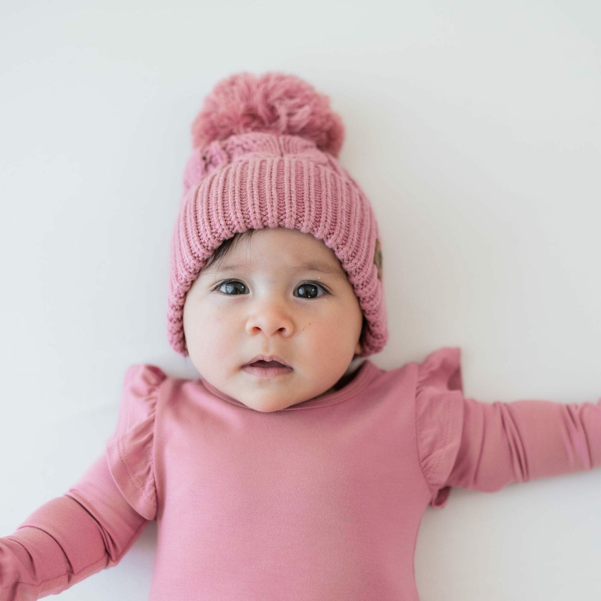 Kyte Baby Chunky Cable Knit Beanie in Apple Blossom