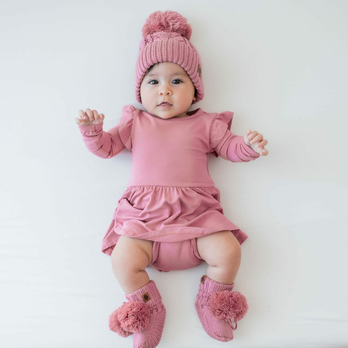 Kyte Baby Chunky Cable Knit Beanie in Apple Blossom