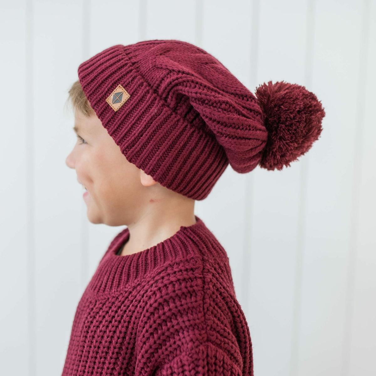Kyte Baby Chunky Cable Knit Beanie in Burgundy