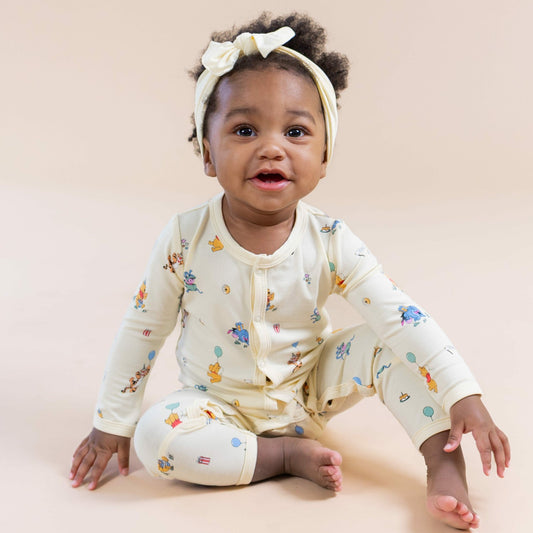 Kyte Baby Romper in Winnie the Pooh Celebration