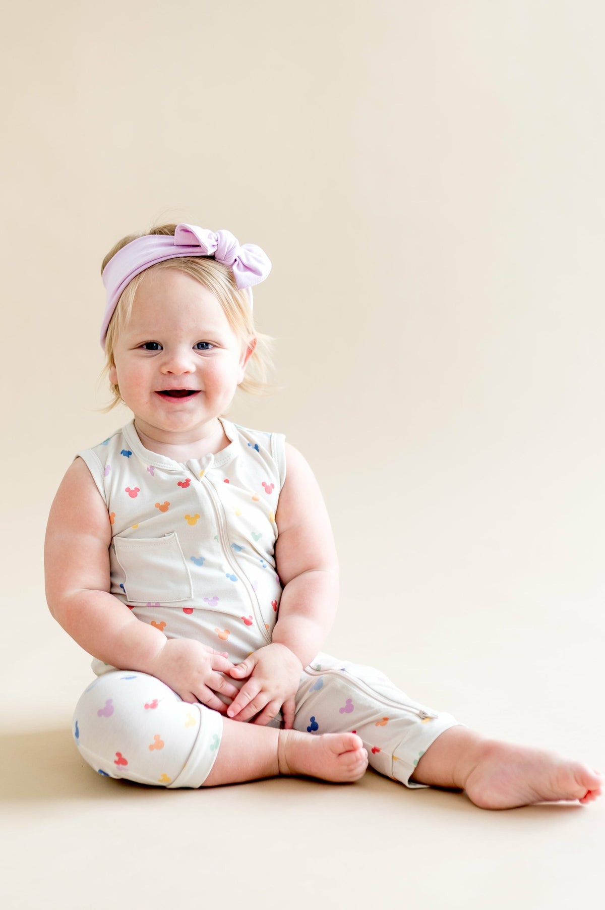Kyte Baby Zippered Sleeveless Romper in Pastel Mickey Mouse