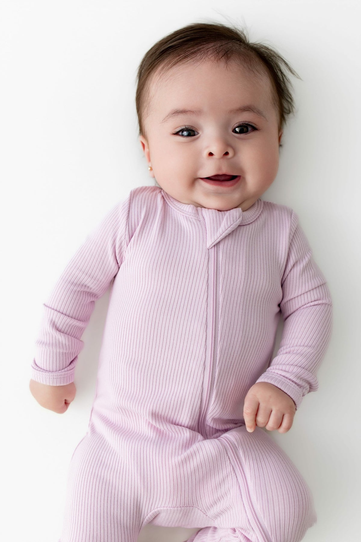 Kyte Baby Ribbed Zipper Romper in Thistle