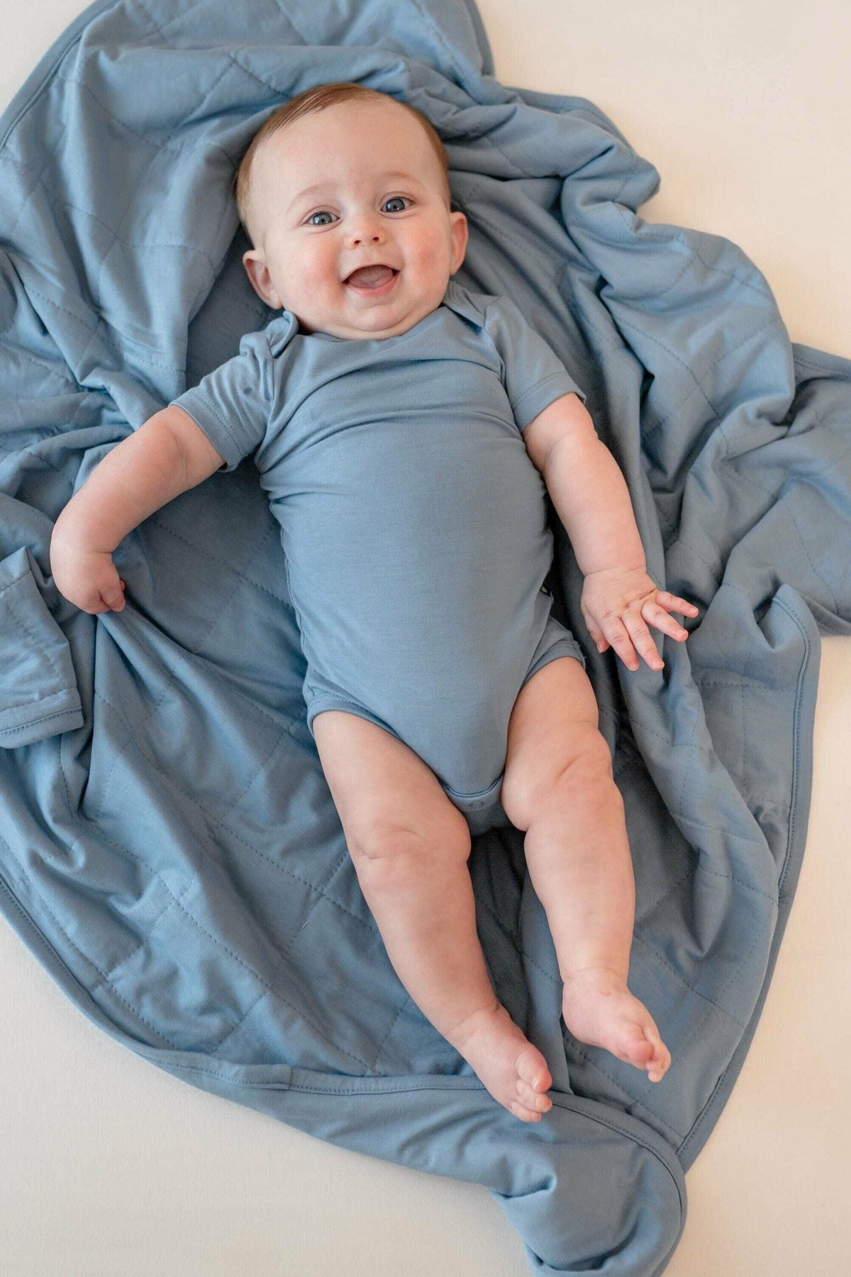 Kyte Baby Bodysuit in Slate