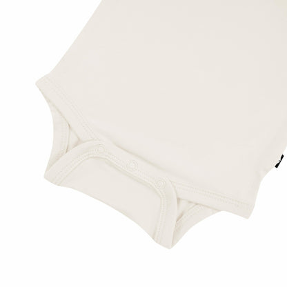 Kyte Baby Long Sleeve Bodysuit in Oat