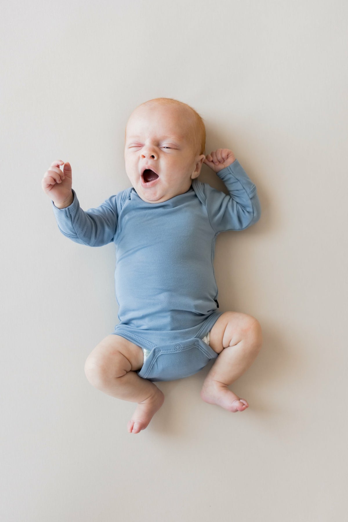 Kyte Baby Long Sleeve Bodysuit in Slate