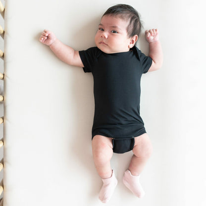 Kyte Baby Bamboo Bodysuit in Midnight