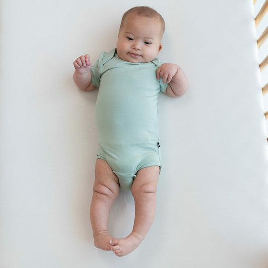 Kyte Baby Bodysuit in Sage