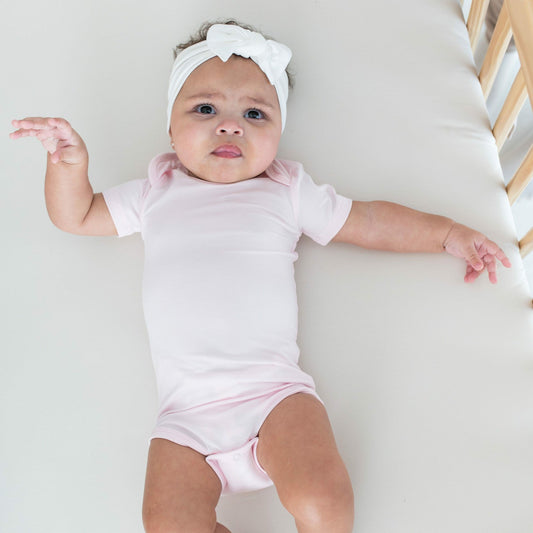Kyte Baby Bodysuit in Sakura