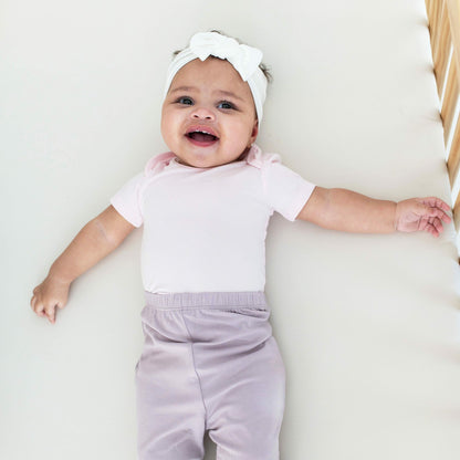Kyte Baby Bodysuit in Sakura