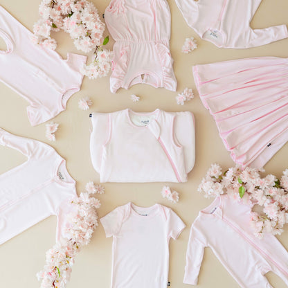 Kyte Baby Bodysuit in Sakura