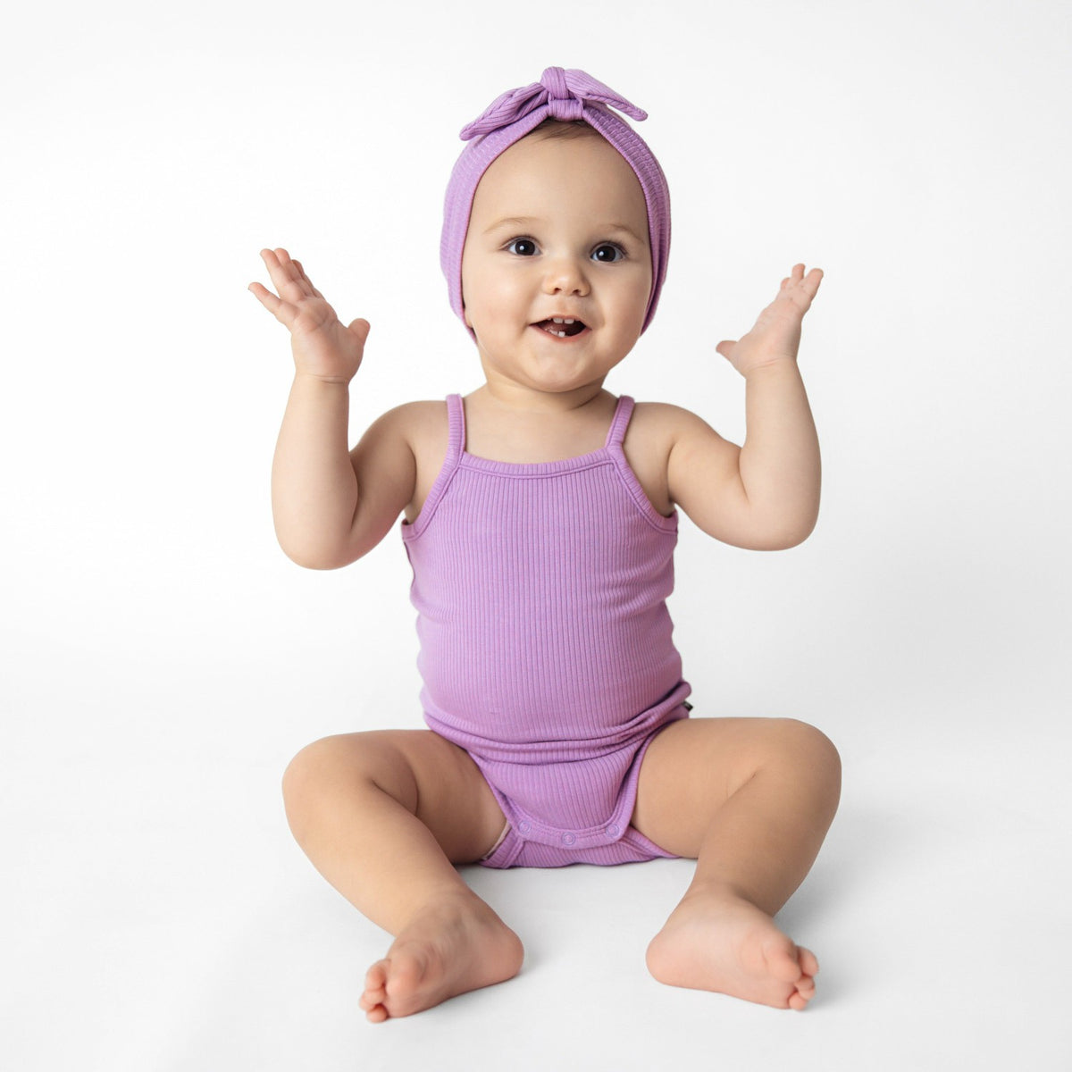 Kyte Baby Ribbed Spaghetti Strap Bodysuit in Poi