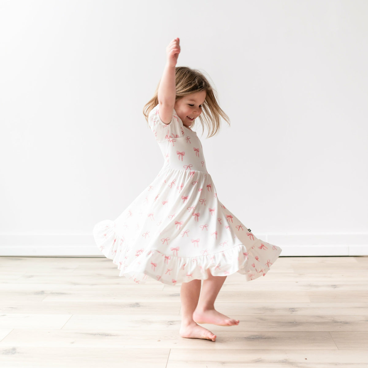 Kyte Baby Puff Sleeve Twirl Dress in Bow