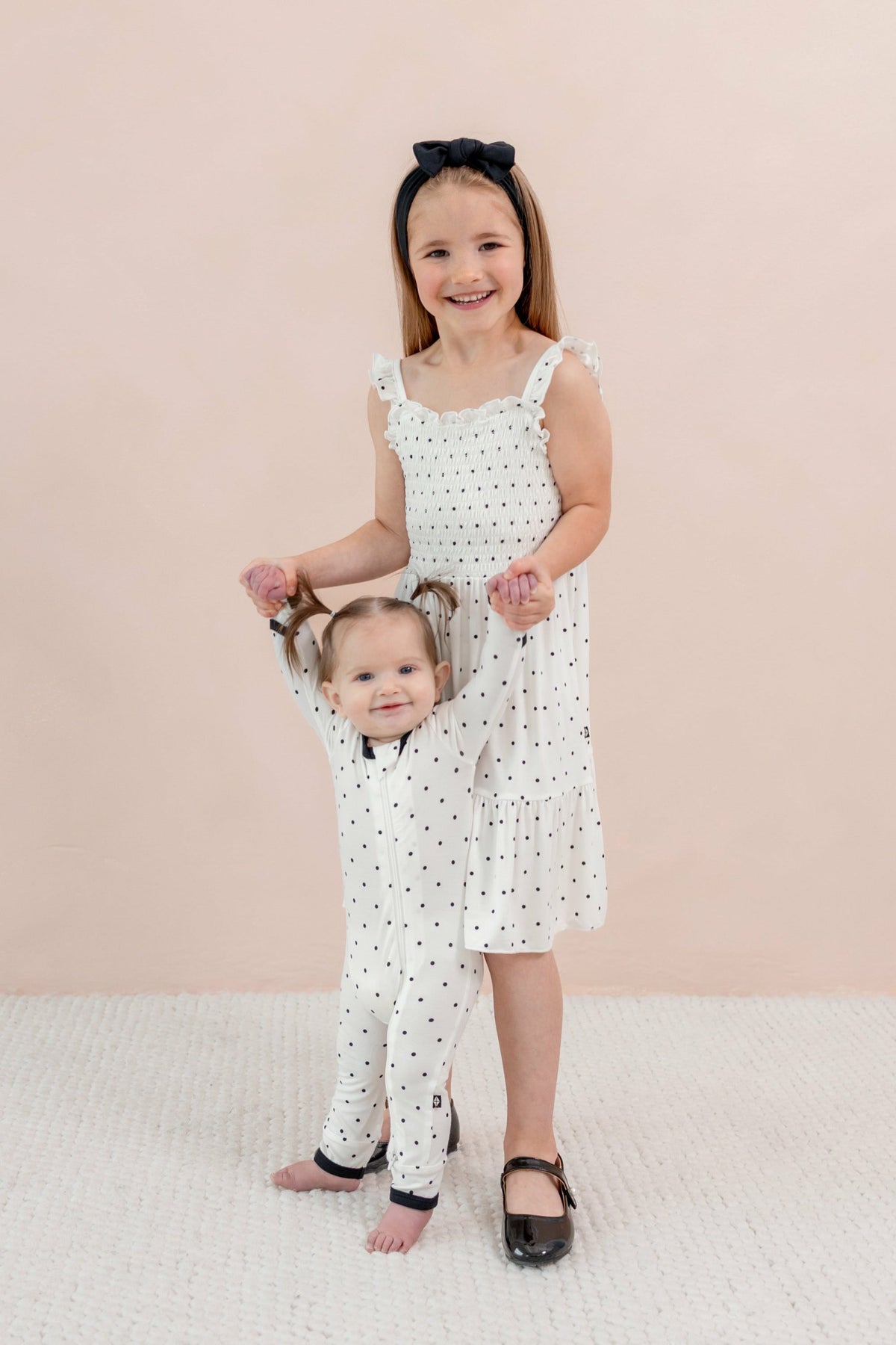 Kyte Baby Smocked Dress in Midnight Polka Dot