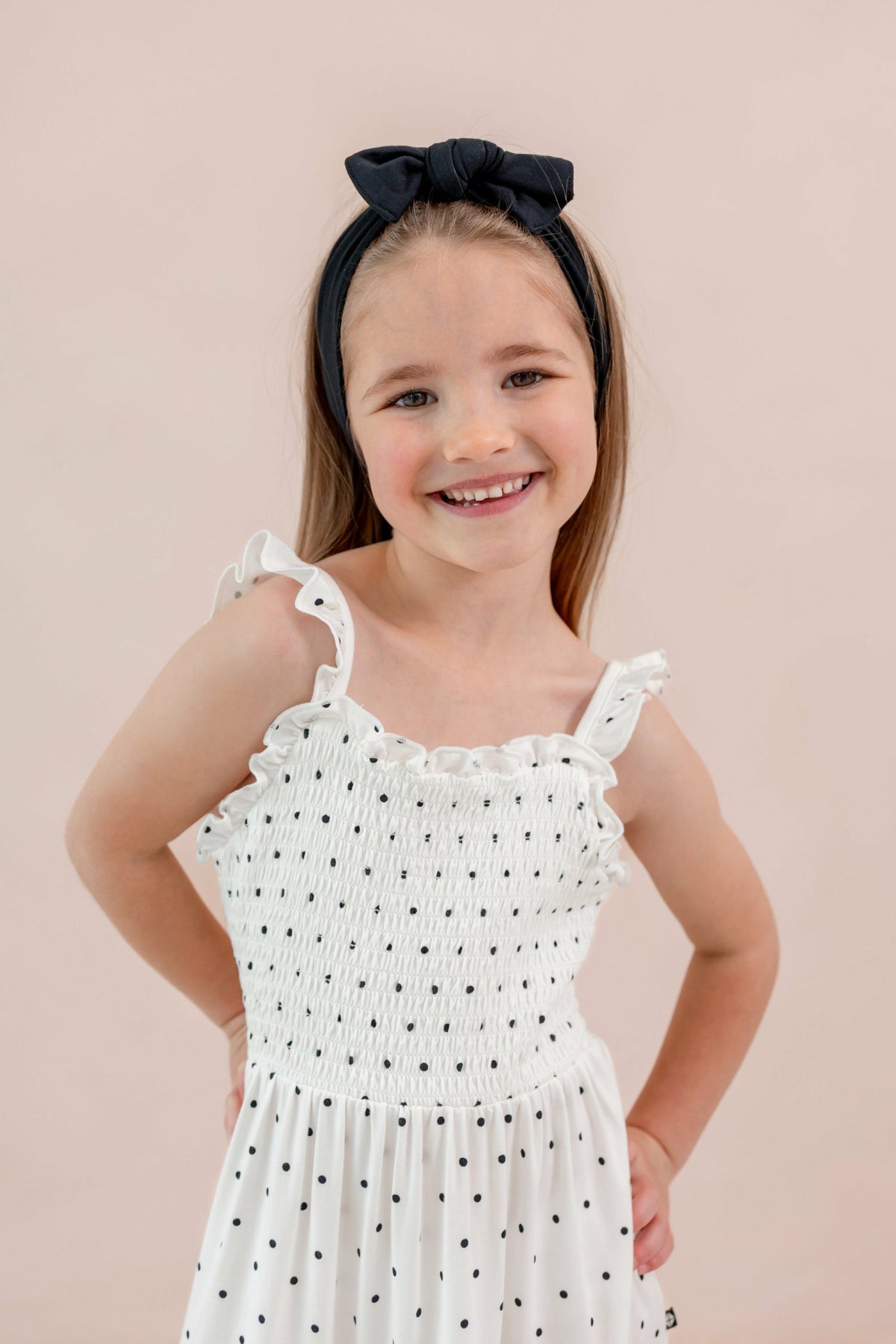 Kyte Baby Smocked Dress in Midnight Polka Dot