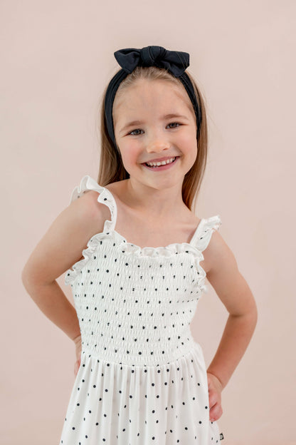Kyte Baby Smocked Dress in Midnight Polka Dot