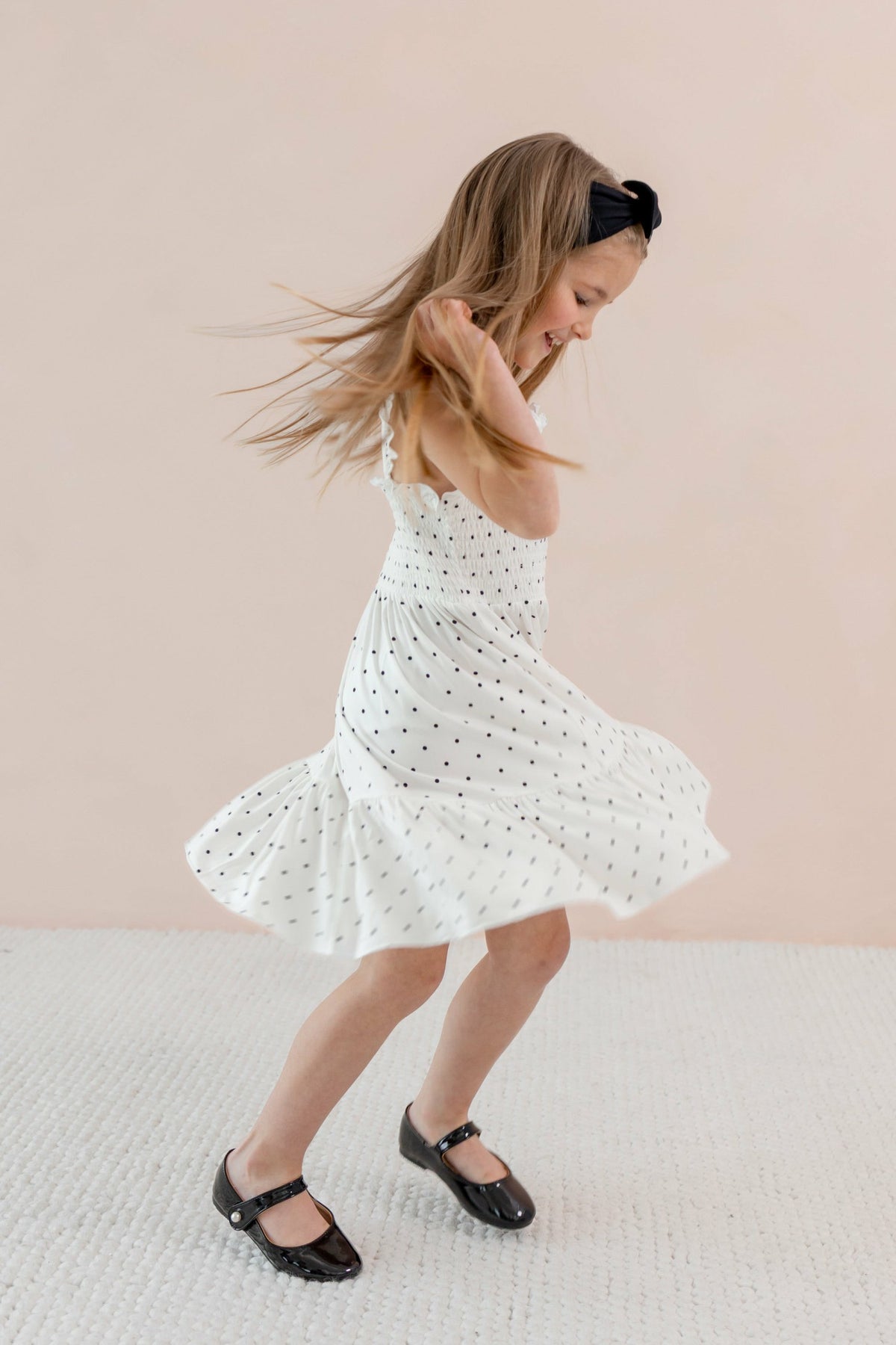 Kyte Baby Smocked Dress in Midnight Polka Dot