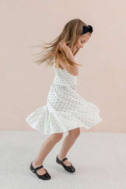 Kyte Baby Smocked Dress in Midnight Polka Dot