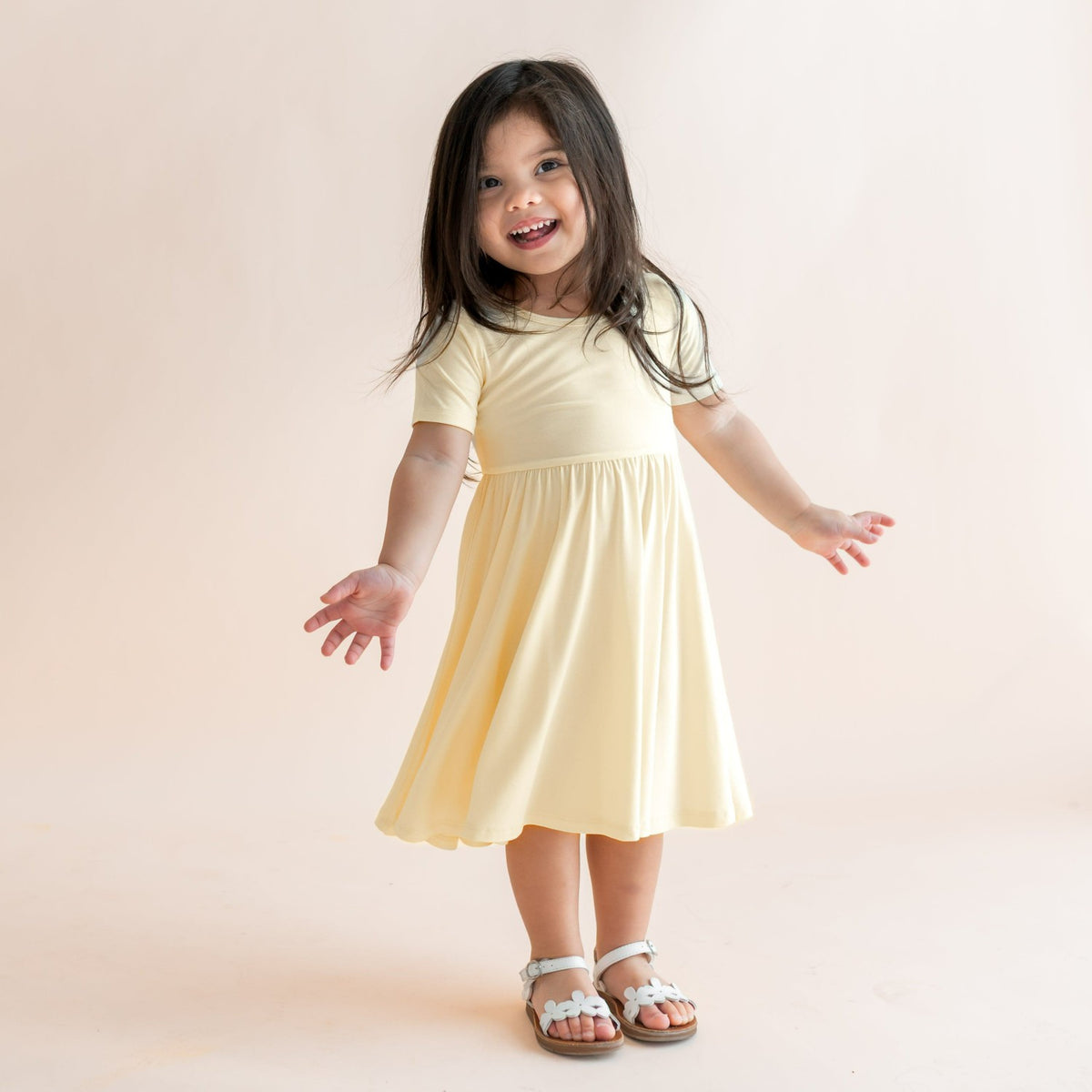 Kyte Baby Twirl Dress in Chamomile