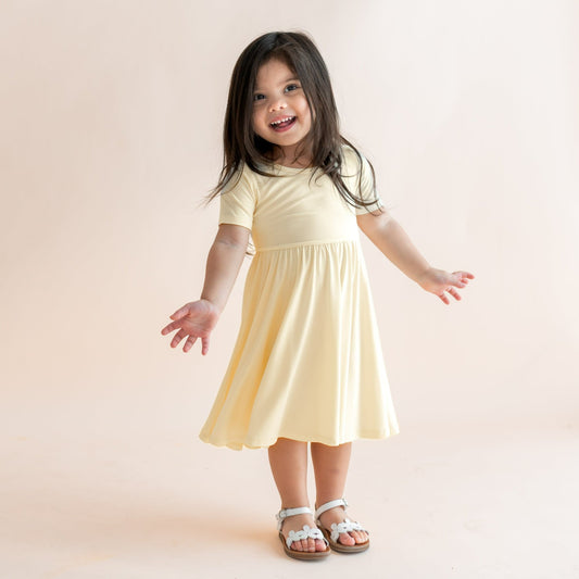 Kyte Baby Twirl Dress in Chamomile