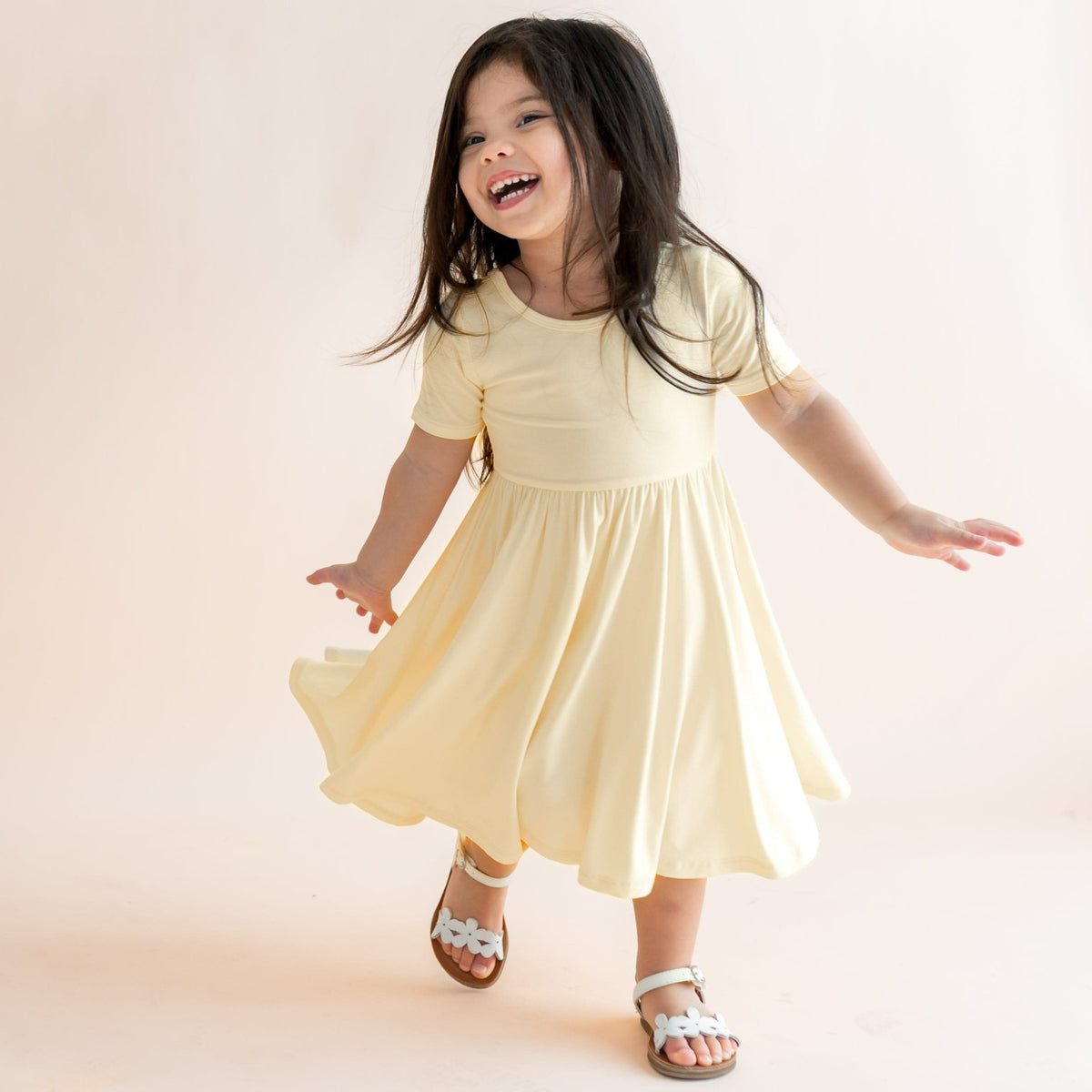 Kyte Baby Twirl Dress in Chamomile