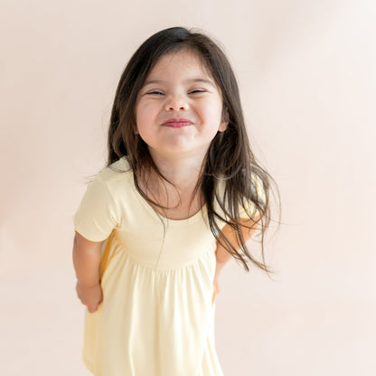 Kyte Baby Twirl Dress in Chamomile