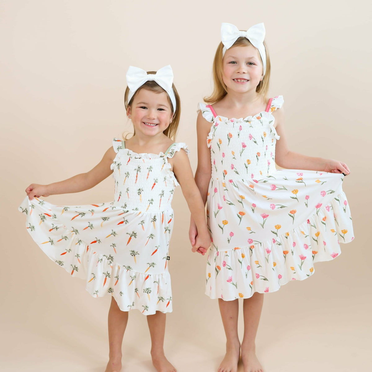 Kyte Baby Smocked Dress in Tulip