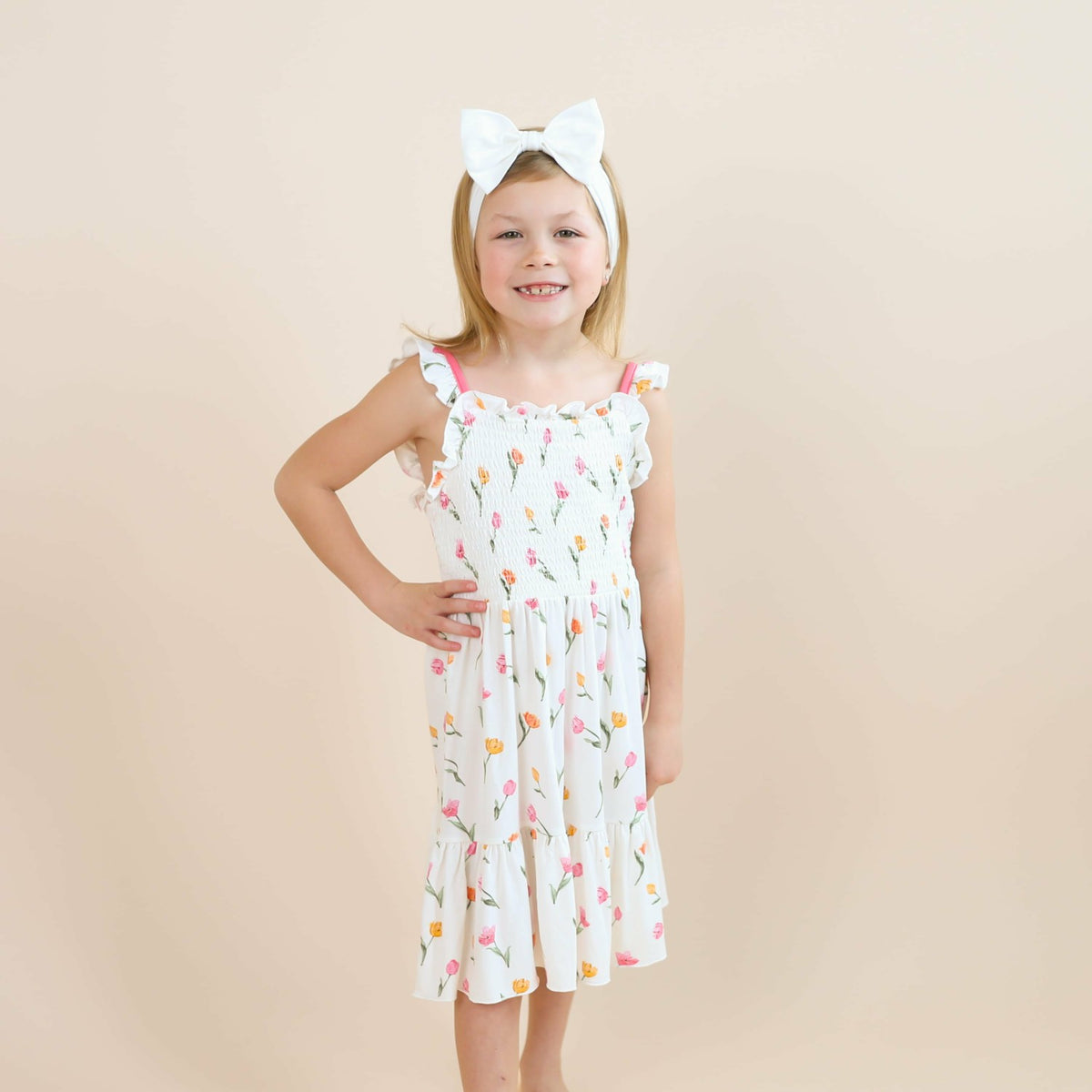Kyte Baby Smocked Dress in Tulip