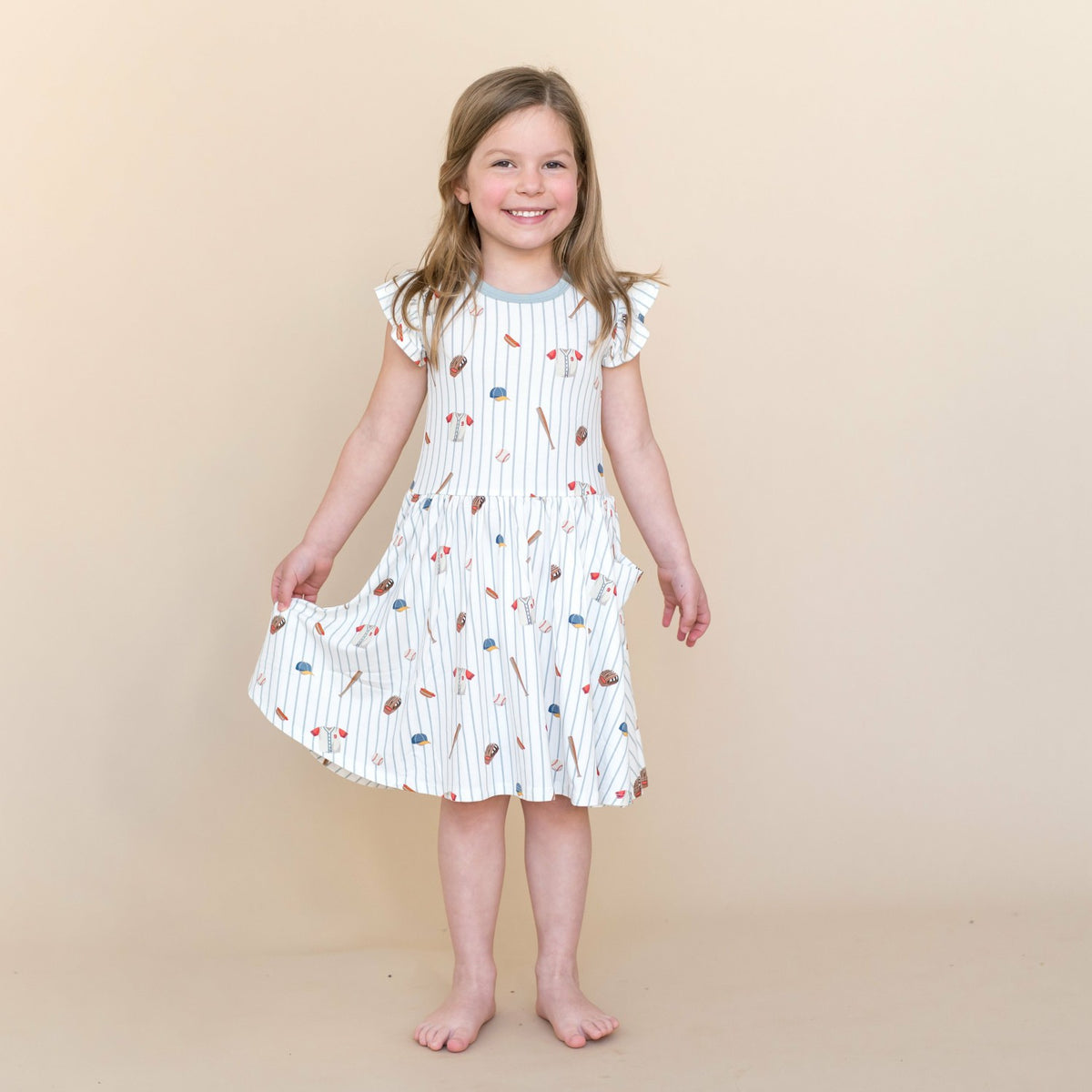 Kyte Baby Pocket Dress in Home Run