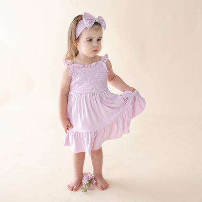 Kyte Baby Smocked Dress in Thistle