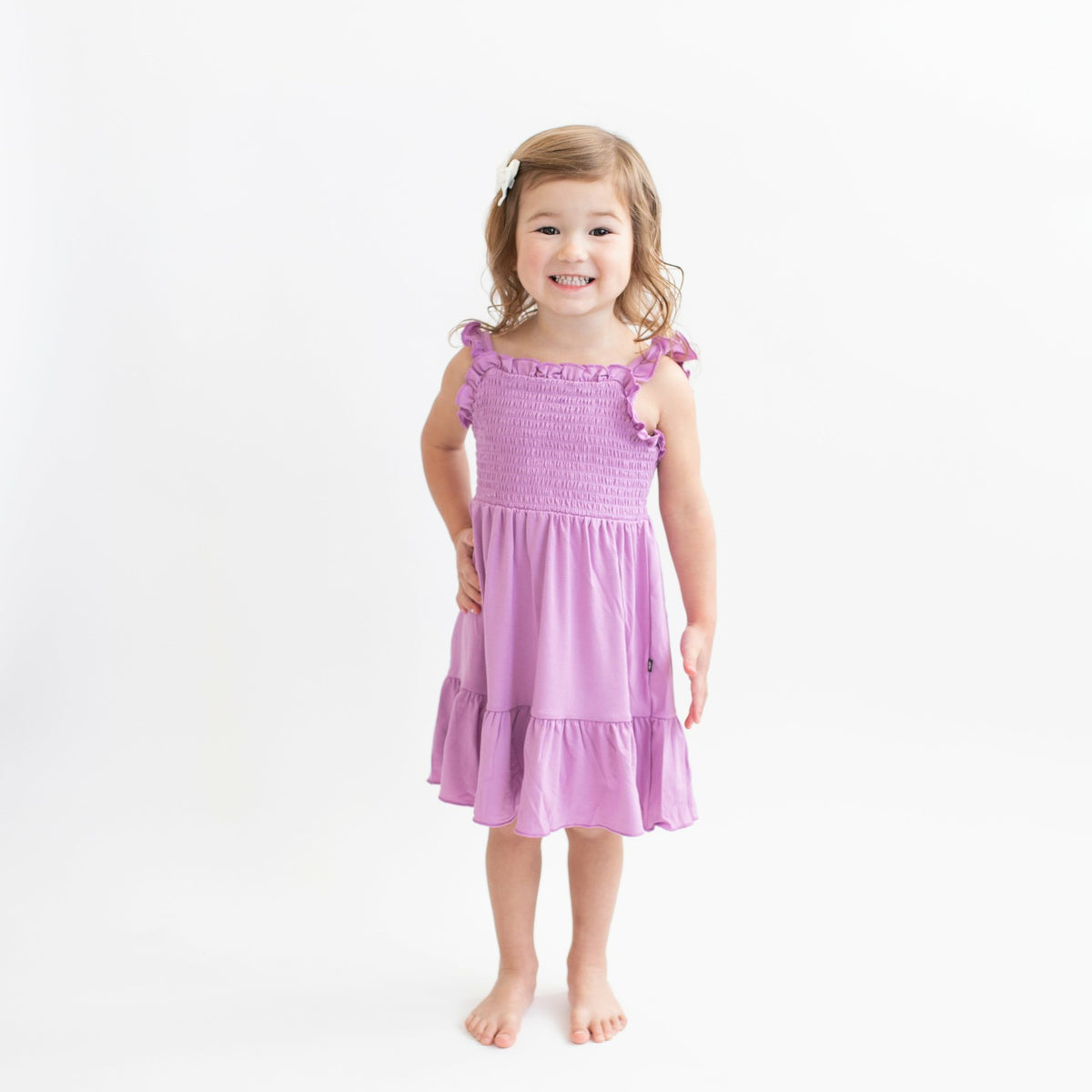 Kyte Baby Smocked Dress in Poi