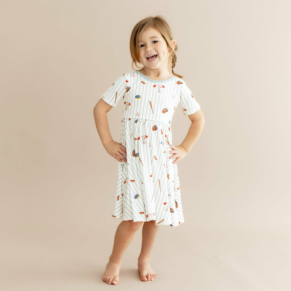 Kyte Baby Twirl Dress in Home Run