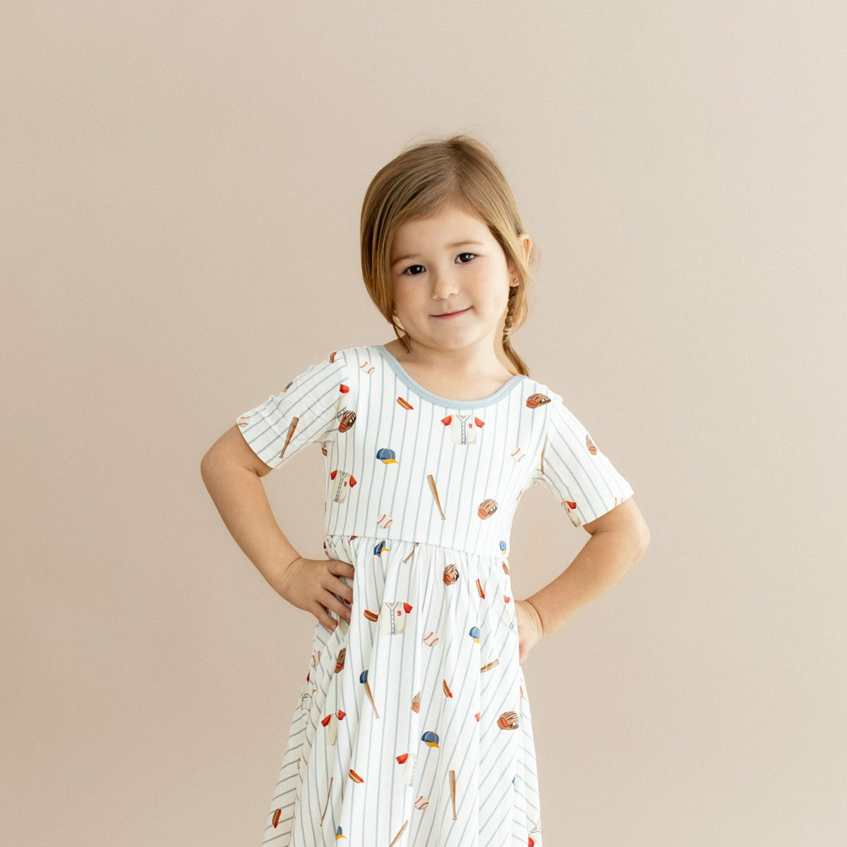 Kyte Baby Twirl Dress in Home Run