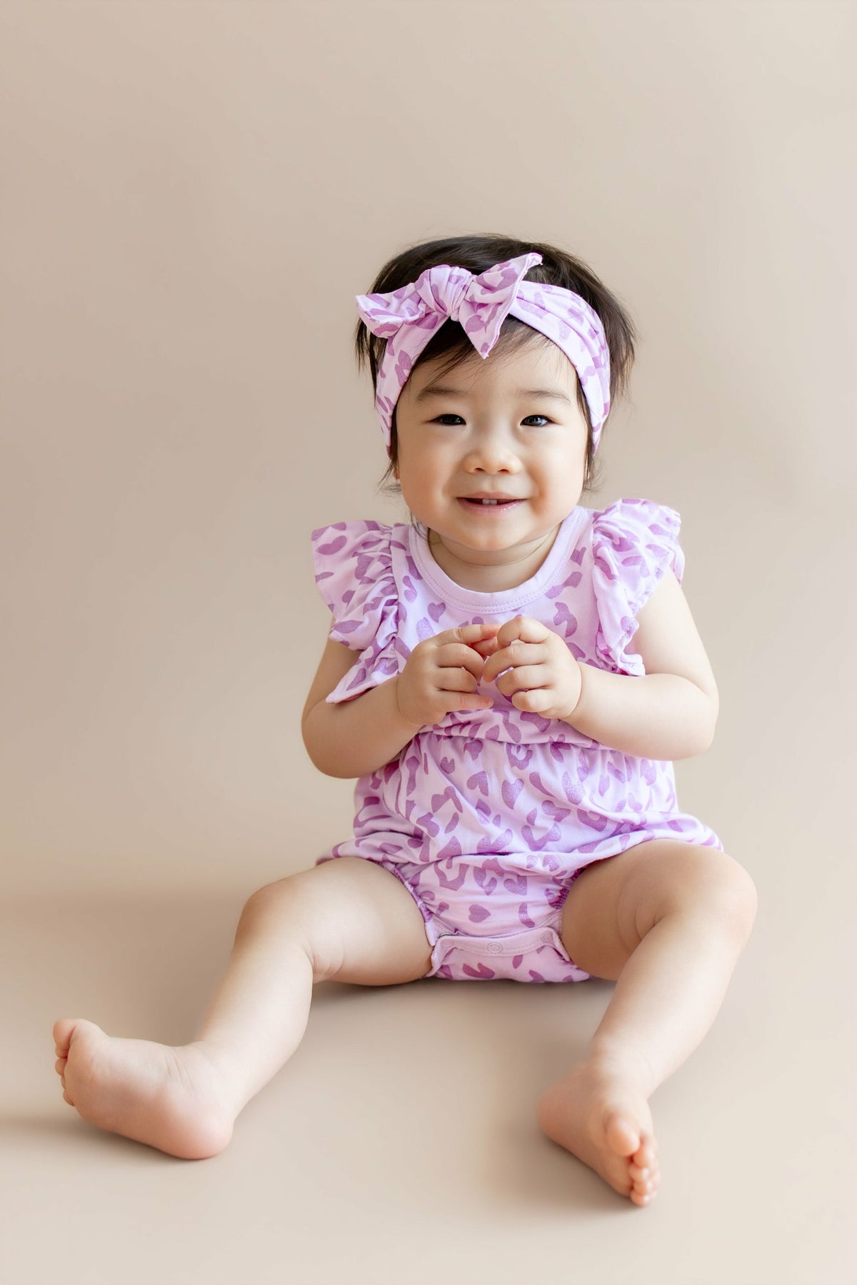 Kyte Baby Bubble Romper in Thistle Leopard