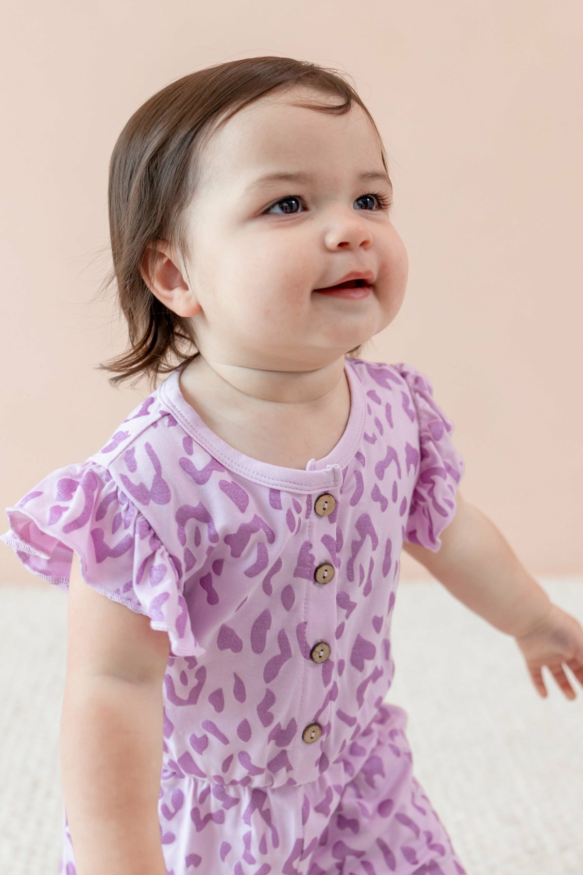 Kyte Baby Flutter Sleeve Romper in Thistle Leopard