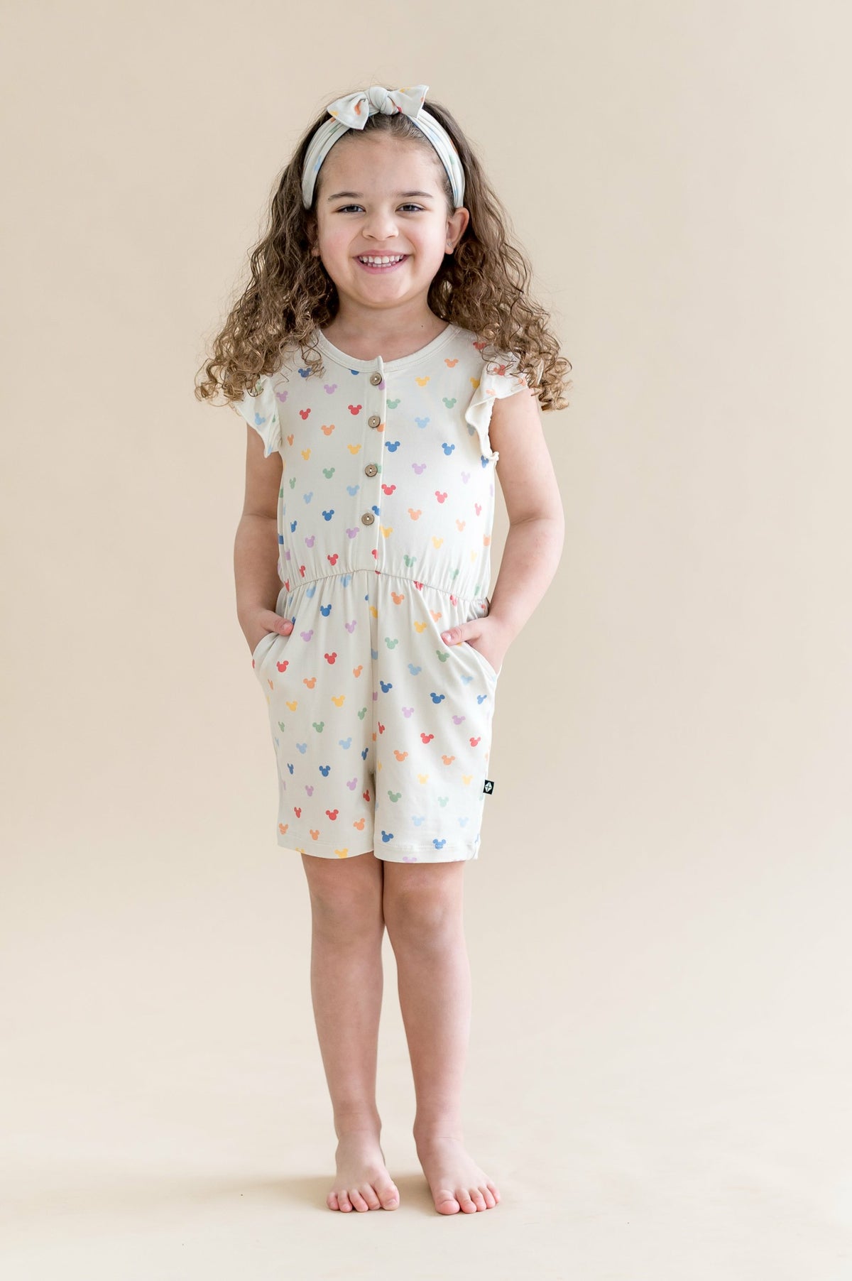 Kyte Baby Flutter Sleeve Romper in Pastel Mickey Mouse