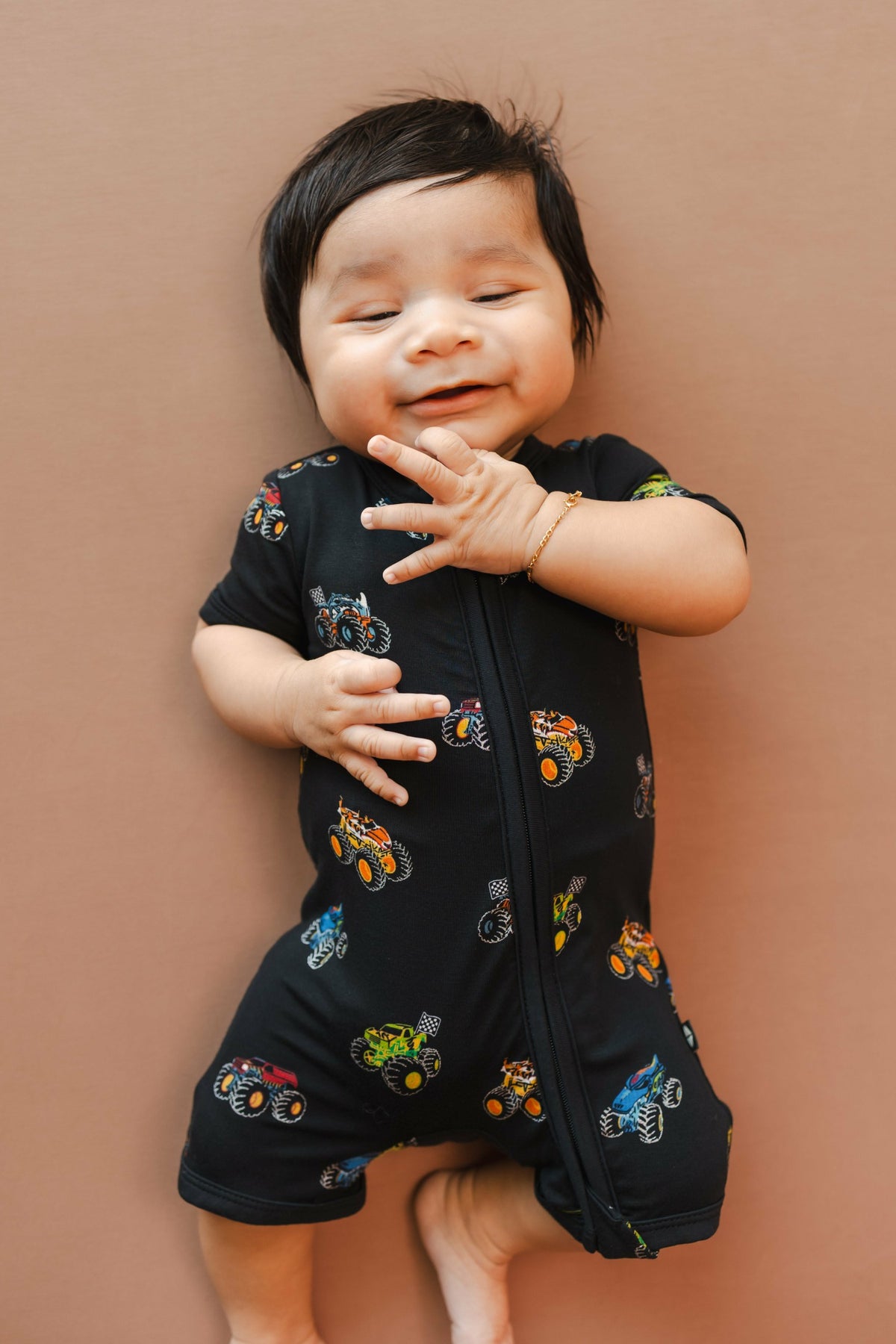 Kyte Baby Zipper Shortall Romper in Monster Truck
